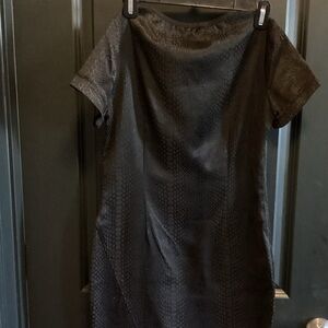 Whitney Eve Black Dress
Asymmetrical Hem
Size S 
Fitted
